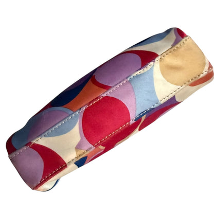 Bottom of Colorful pouch with CC pattern on a white background