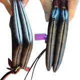 Corners of CC Wristlet on a white background