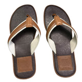 Top of a Pair of brown and white sandals on a white background
