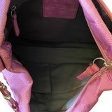 purple bag with a purple zipper on a white background