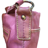 Side of purple of purse with silver hoop buckle on a white background