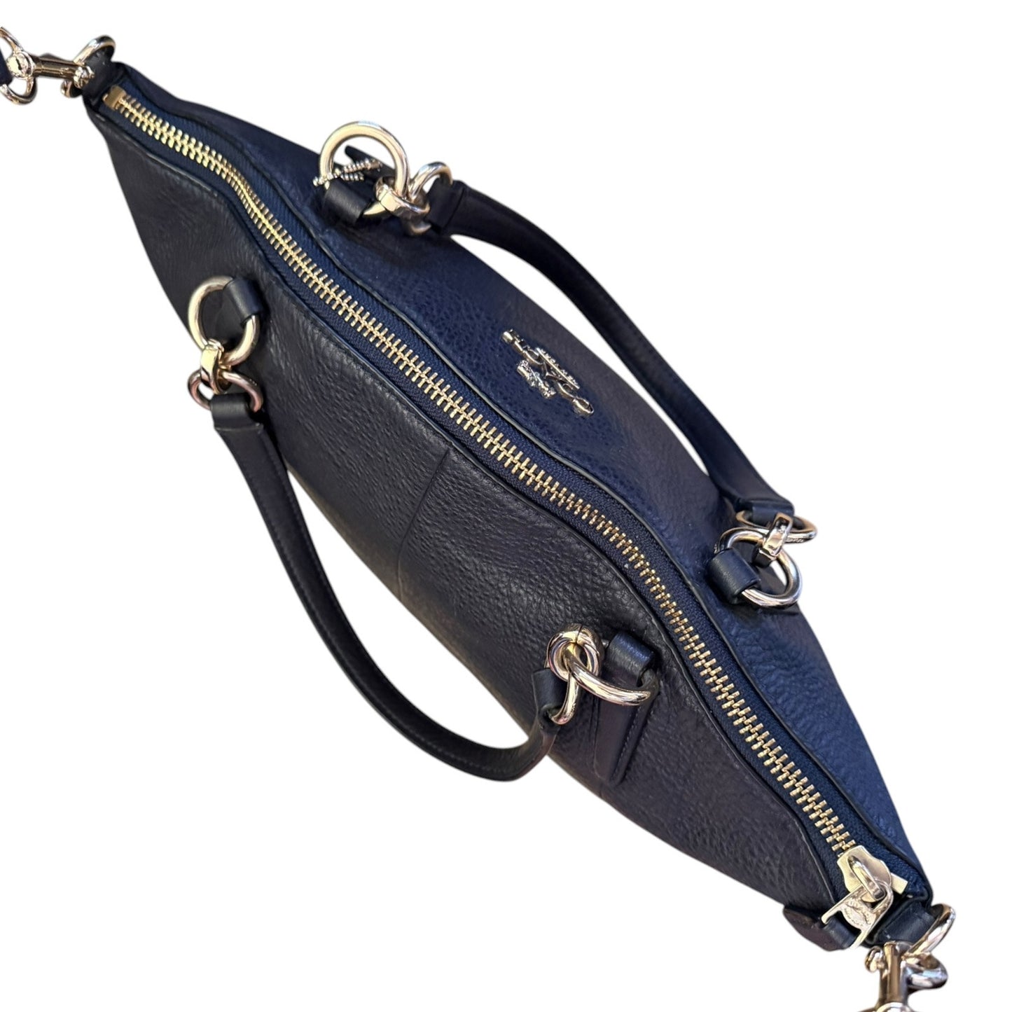 Top view of black leather purse with handles, shown on a plain white background.