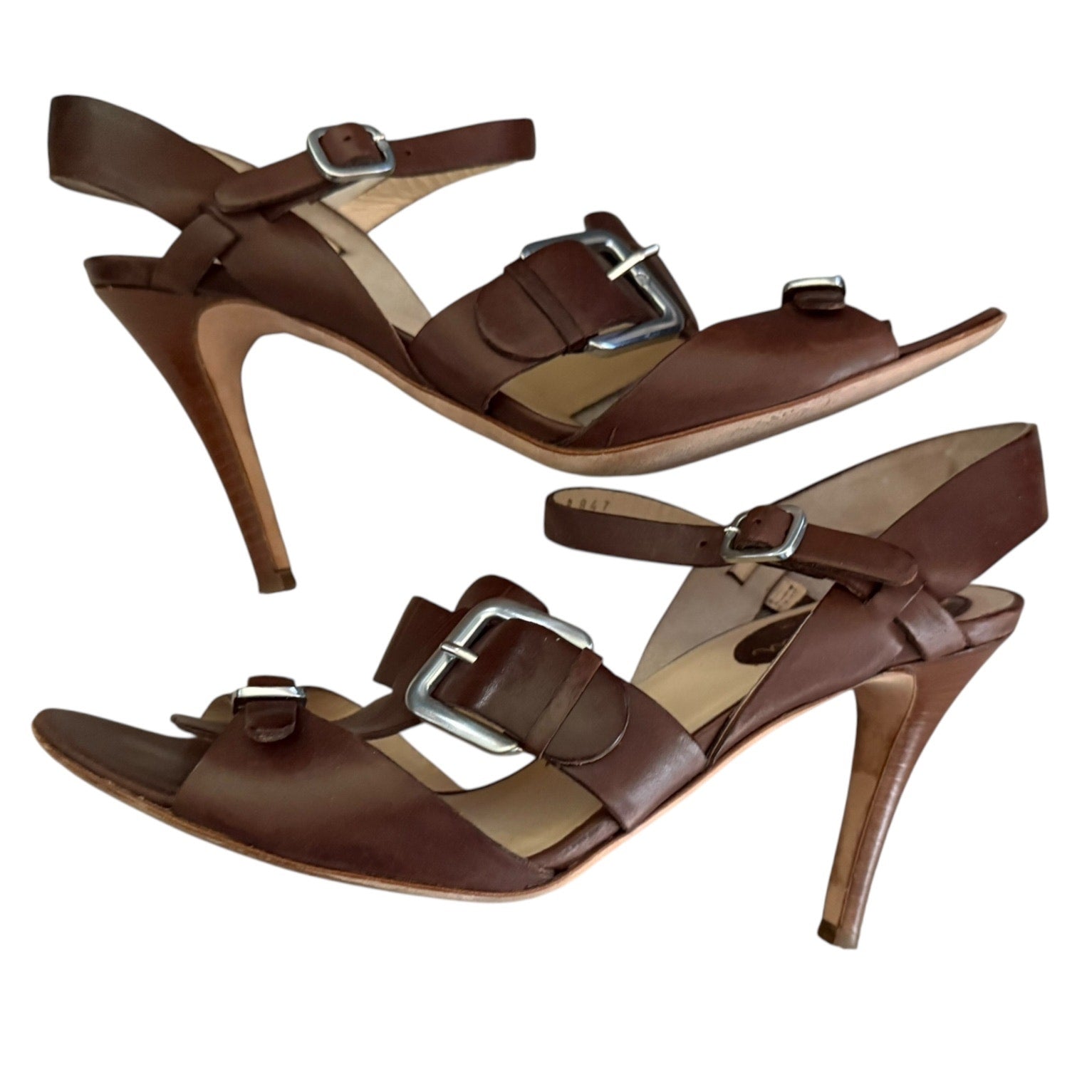 Side view 1 brown high-heeled sandals with buckles on a white background