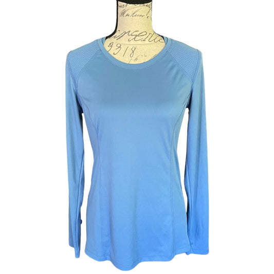 Blue long-sleeve top on a mannequin with a white background