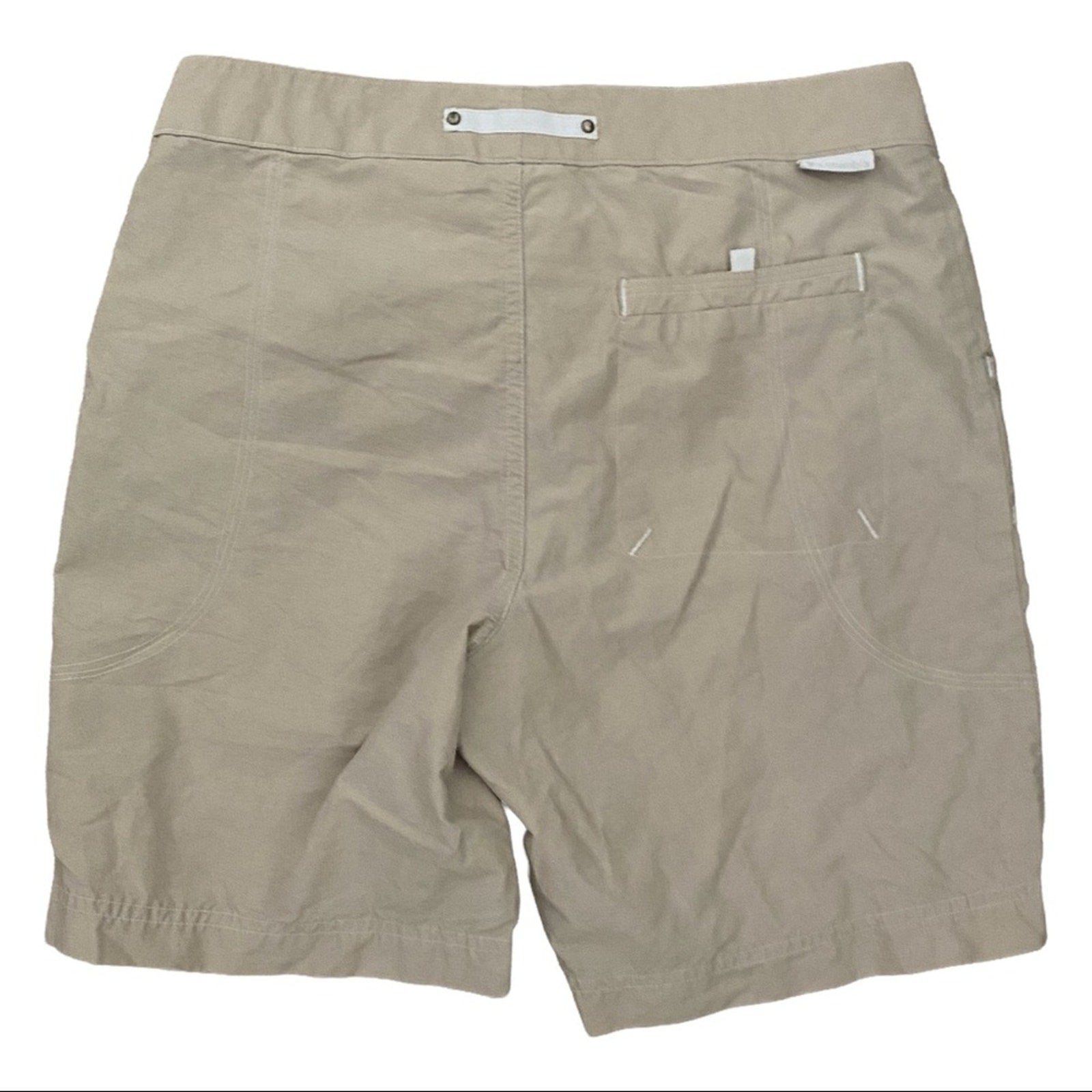 Back of Beige shorts on a white background