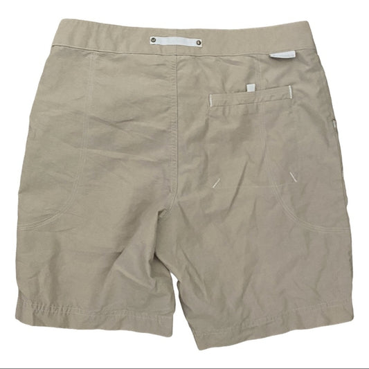 Back of Beige shorts on a white background