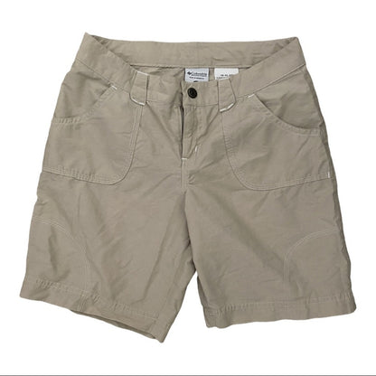 Front of Beige shorts with a visible brand label on a white background