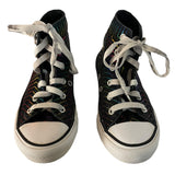 Front of rainbow converse sneakers 