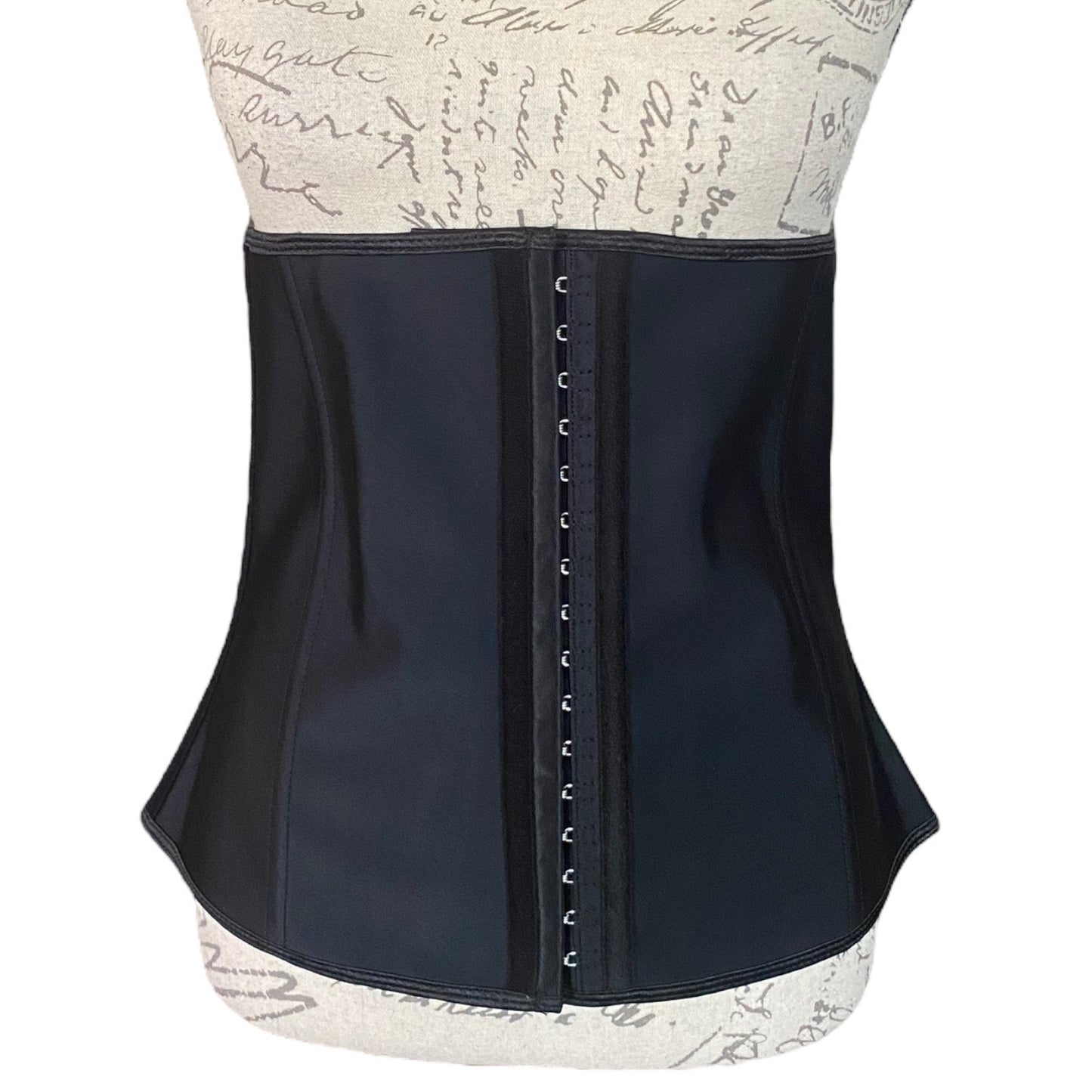 Front of Black waist trainer with a patterned top and bottom on a white background
