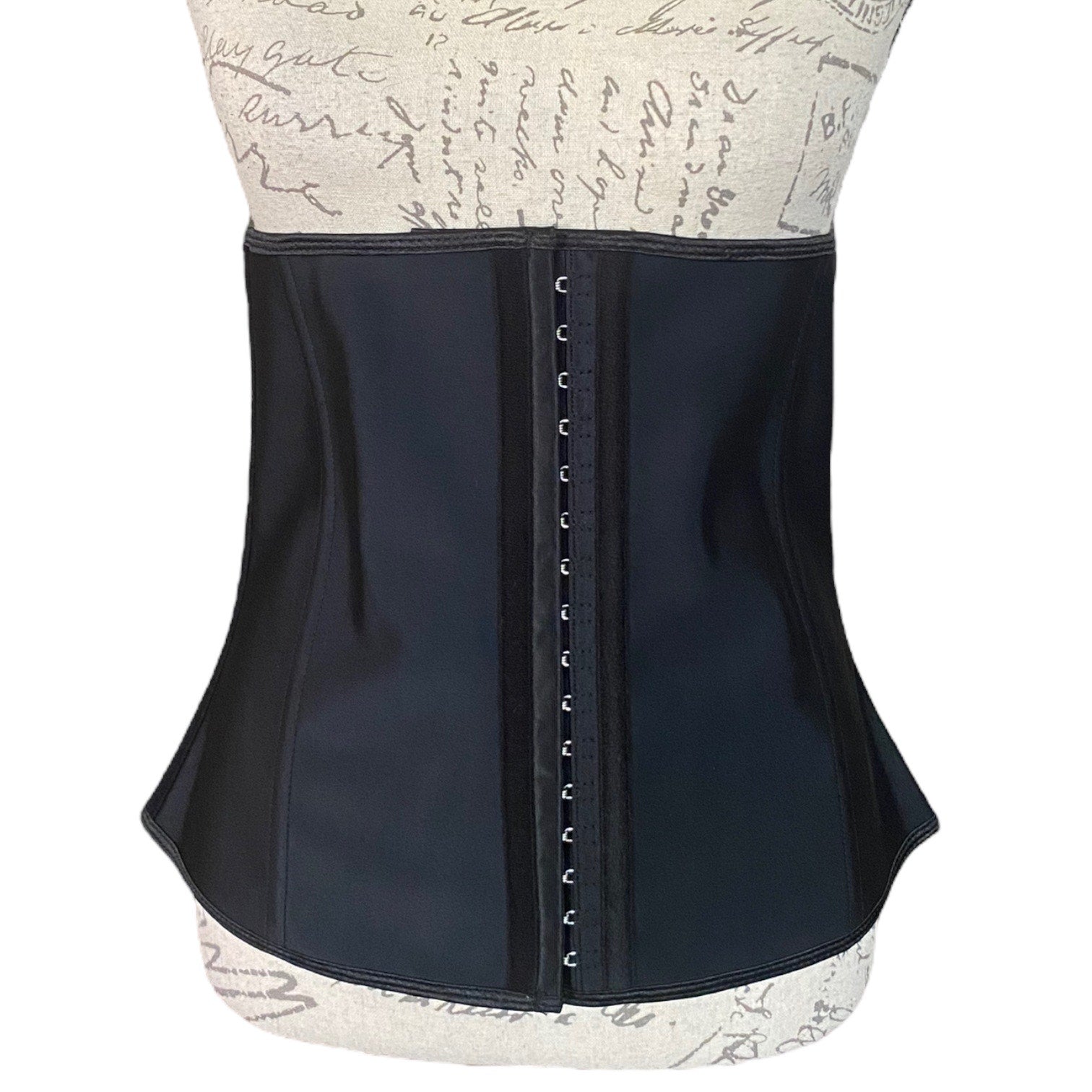 Front of Black waist trainer with a patterned top and bottom on a white background