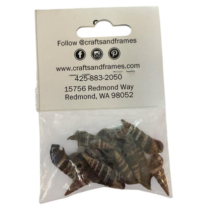 Packaged items with a clear window on a white label displaying contact information with shells
