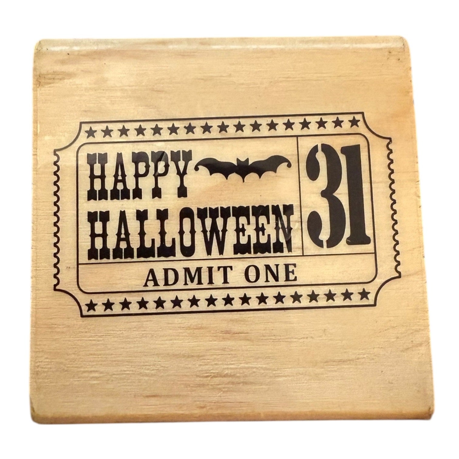 Wooden block with 'Happy Halloween 31 Admit One' design on a white background