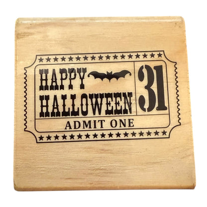 Wooden block with 'Happy Halloween 31 Admit One' design on a white background