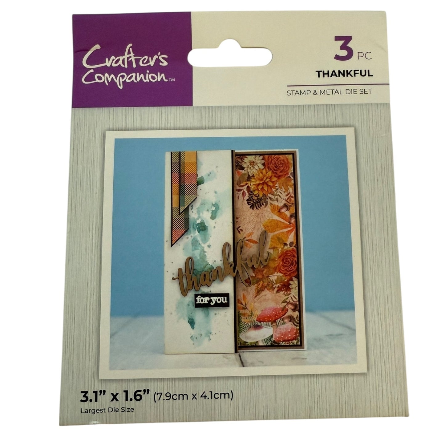 Packaged stamp and metal die set with 'Thankful' design, featuring Crafter's Companion branding.