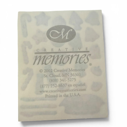 Creative Memories product packaging with brand logo and contact information.