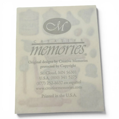 Back of a product packaging with 'Creative Memories' branding and contact information.