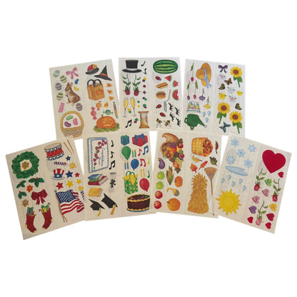 8 sheets of colorful stickers with autumn and seasonal designs, including pumpkins, leaves, flowers, stars, and musical notes, arranged on a white background.