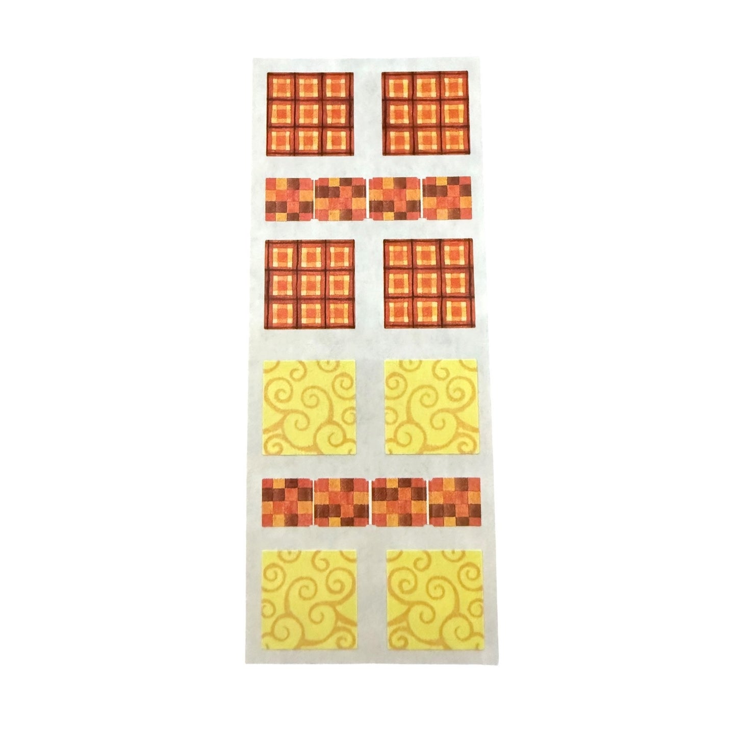 Yellow and orange square stickers on a white sheet on a white background