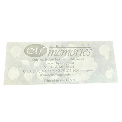 Back of a sticker sheet with creative memories on it with a white background. 