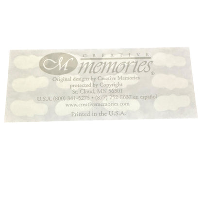 Creative Memories info on the back of a sticker sheet with contact info on a white background. 