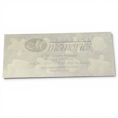Back of sticker sheet with 'Creative Memories' logo and contact information on a white background