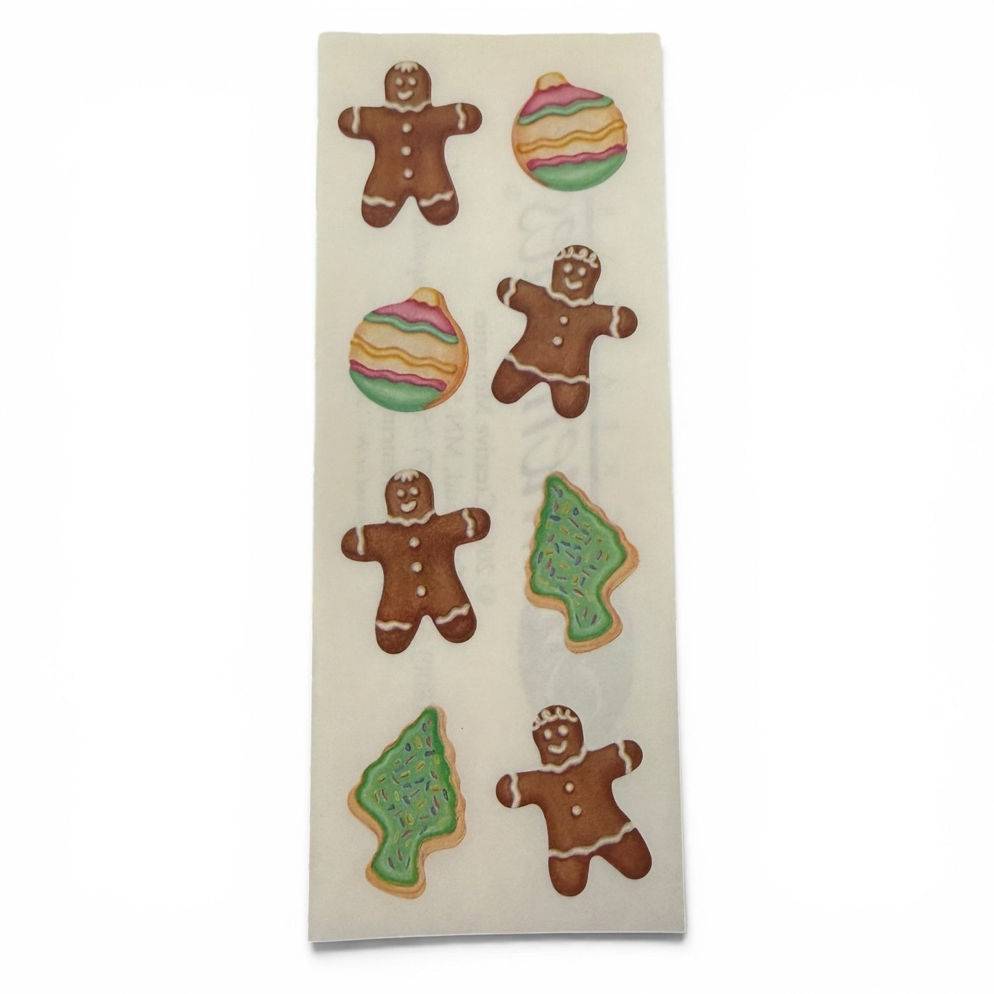 Sticker set with gingerbread men and Christmas tree design on a white background