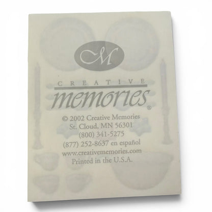 Back of a product packaging with 'Creative Memories' branding and contact information.