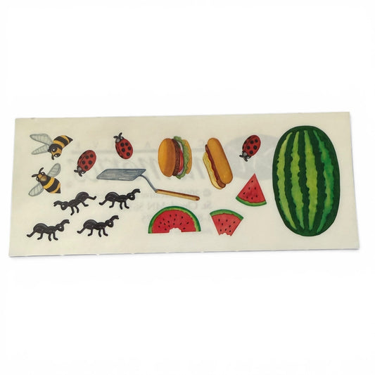 Sheet of stickers with various designs including watermelons, hamburgers, and insects on a white background.