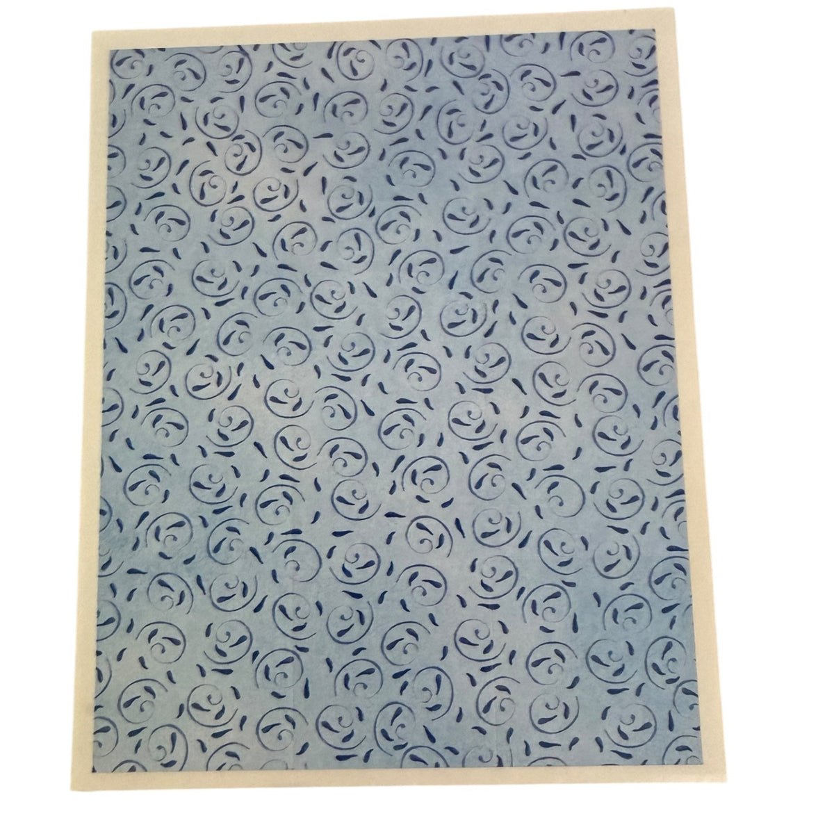 Patterned sticker with blue rose design on a white background