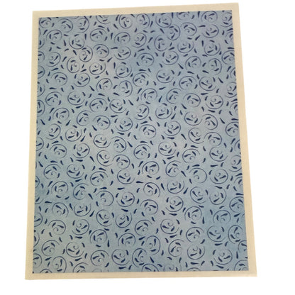 Patterned sticker with blue rose design on a white background
