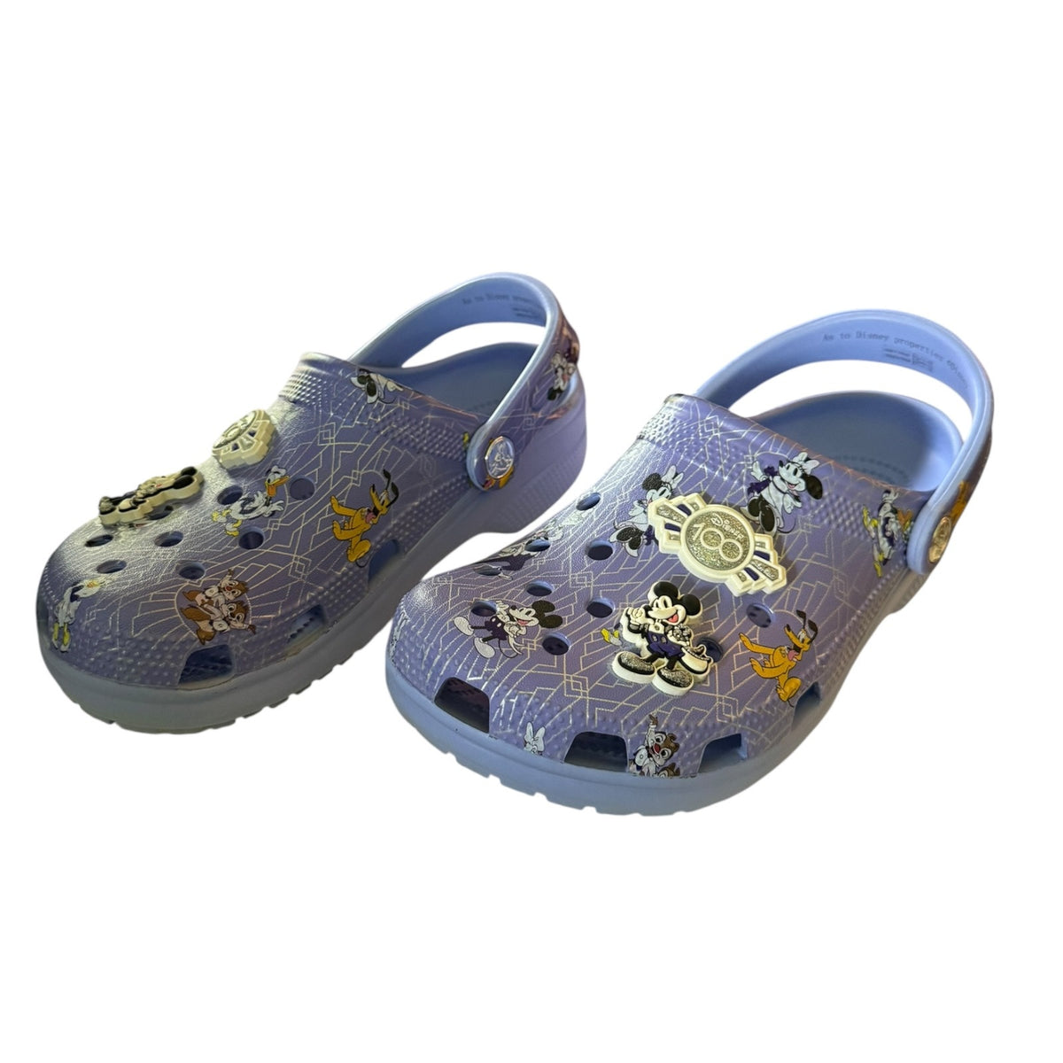 Disney clogs with cartoon character design on a white background
