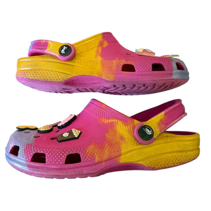 Side of Pink and yellow clogs with tie-dye pattern on a white background