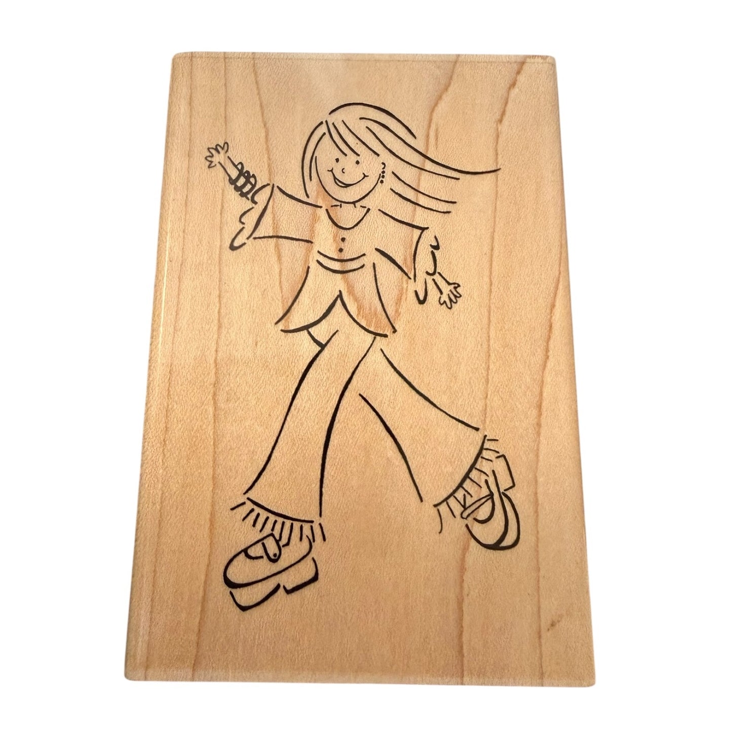 Wooden block with a black line drawing of a person on a white background