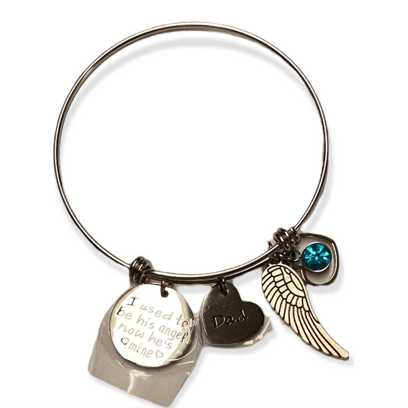 Silver bracelet with 4 charms