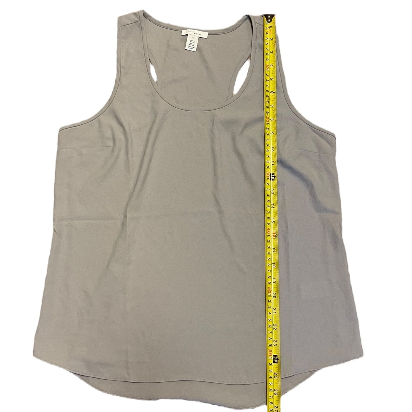 Gray tank top with a measuring tape on a white background