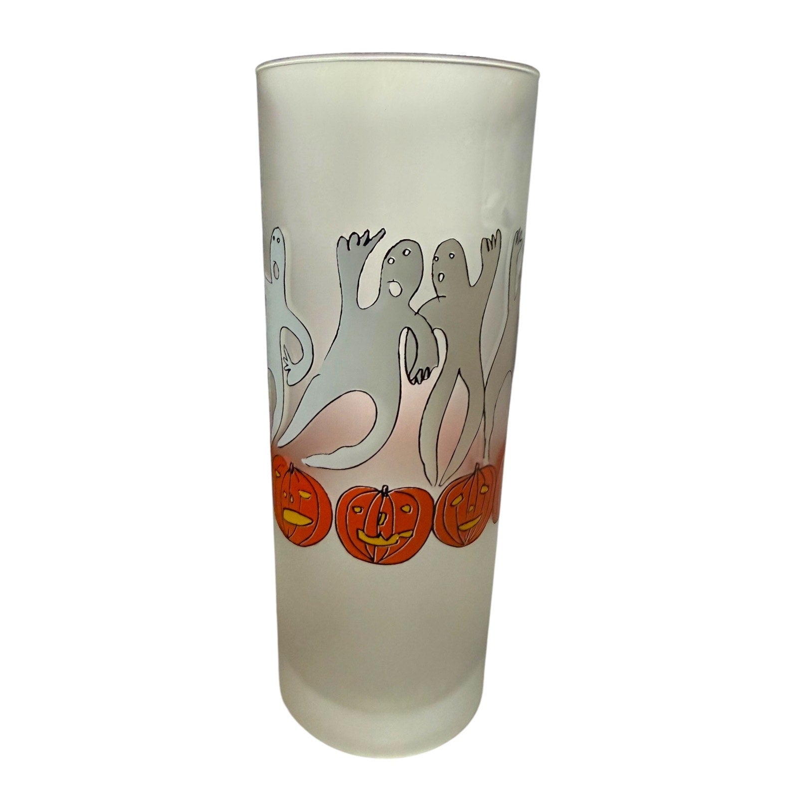 Frosted glass tumbler with ghost and pumpkin design on a white background