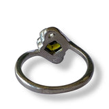 Back view of green silver ring