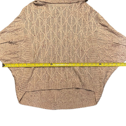 Sweater with a measuring tape for size reference on a white background