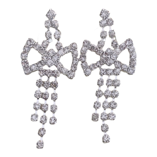 Pair of silver chandelier earrings on a white background