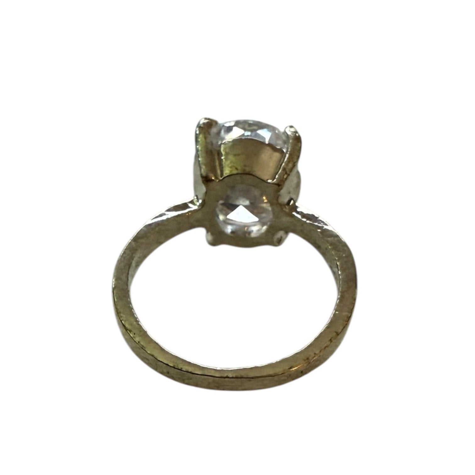 Silver ring with large CZ stone on a white background