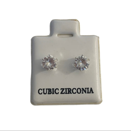 A pair of round cubic zirconia stud earrings in a silver-tone setting, mounted on a white display card labeled 'CUBIC ZIRCONIA'.