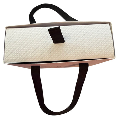 White handbag box with black handles on a white background