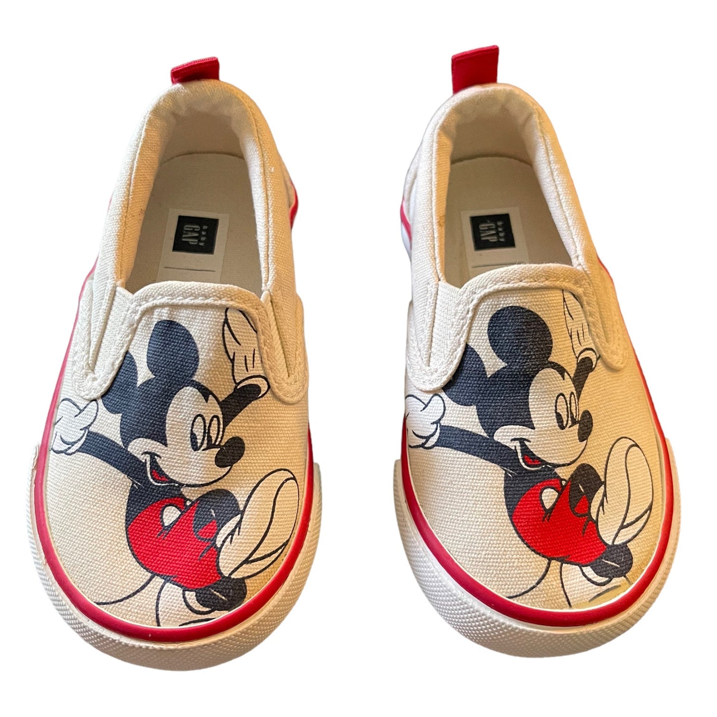 Front of a Pair of children's shoes with Mickey Mouse design on a white background