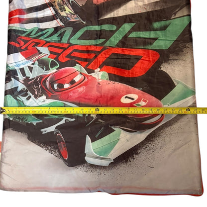 Sleeping bag with race car design and 'Mach Speed' text, measured with a tape measure.