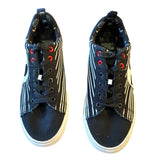 Pair of black and white sneakers with red accents on a white background