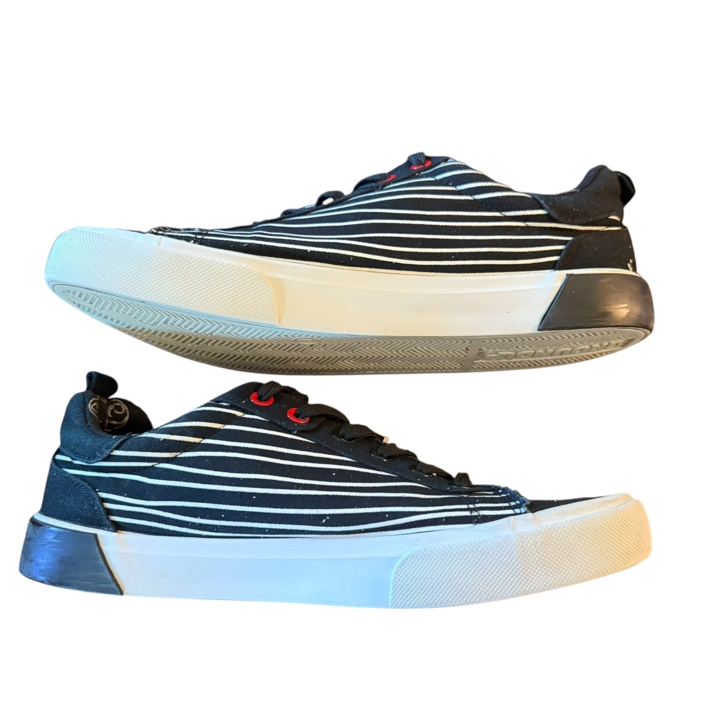 Pair of striped sneakers on a white background