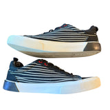 Pair of striped sneakers on a white background