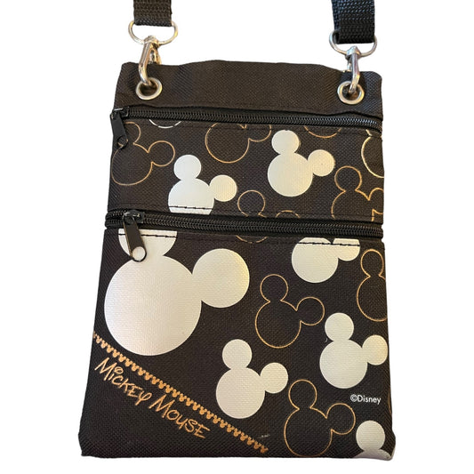 Close up of black Mickey Mouse small pouch purse in a white back ground