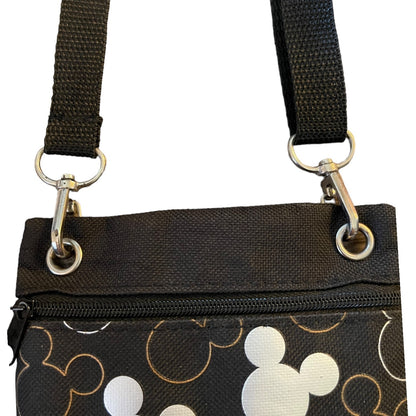 Close up of handbag straps on a white background