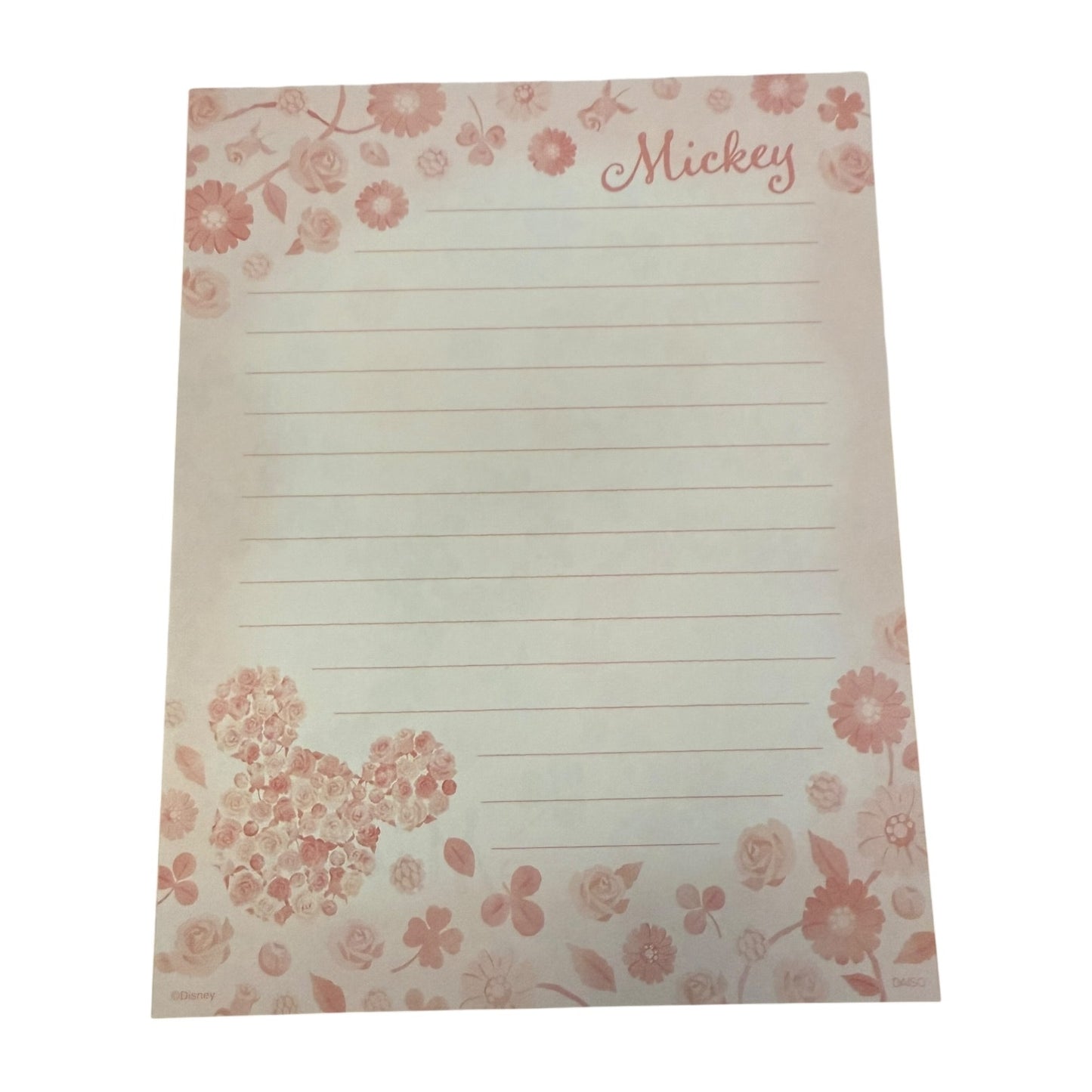 Floral design stationary with 'Mickey' text on a white background
